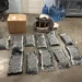 Ocupan 11 paquetes de presumible marihuana ocultos en un mueble en el AILA
